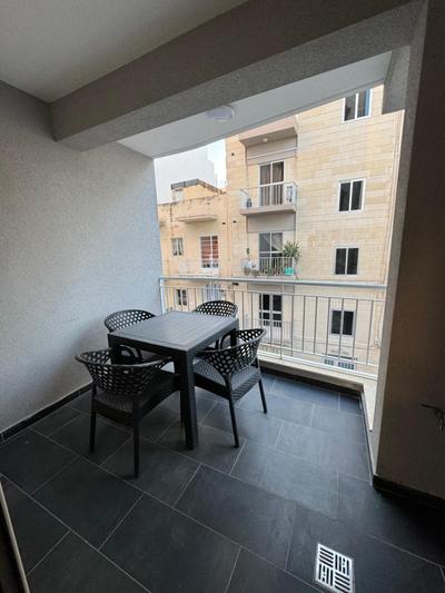 Spacious 2BR Apartment with Terrace - by HostMT