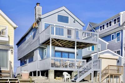 Cheerful 3 Bedroom Beach Front Cottage with Fire Place