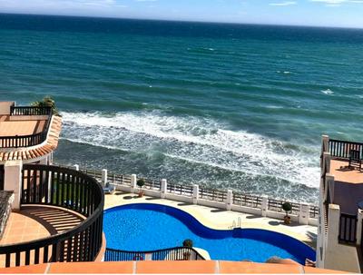 Beachfront Penthouse Apartment with Large Terrace and Breathtaking Sea Views close to Marbella Spain