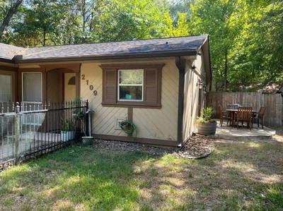 Enchanted Haven-A serene cottage in the Woodlands!