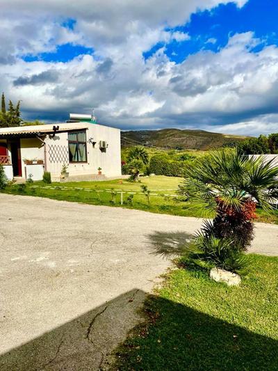 Strelitzia's house with heated pool , private garden and private parking & wi-fi