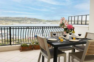 GhadiraBay seafront with sea views by Homely