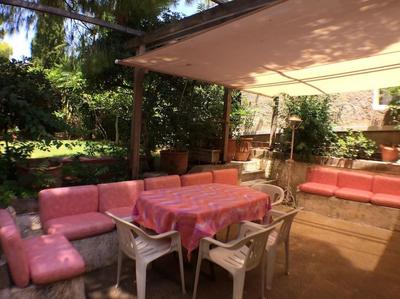 Athens Riviera garden recluse, close to sea n city