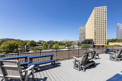 2BR Downtown Apartment with Gym & Deck