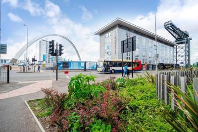 Luxury Huge Modern Open Plan 2Bedroom Flat - Free Private Parking & Balcony located at the OVO Hydro and SEC Centre