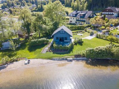 Exklusives Seehaus LAKEHOUSE in Bestlage mit privaten Sandstrand inklusive Boot, Kajak, SUP