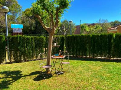 Casa con jardín privado, BBQ y piscina comunitaria