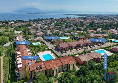 Paradise Lake View in a 5 pools exclusive residence DesenzanoLoft Official Partner Homes & Villas by Marriott Bonvoy