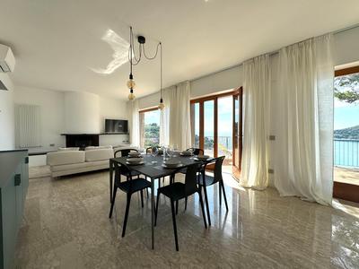 Modern and Elegant apartment with a spacious sea view terrace overlooking Palmaria Island Bright designer interiors Fully equipped Up to 6 guests Private p