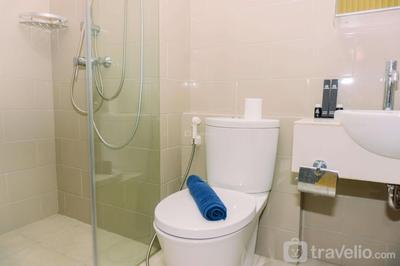 Comfortable and Modern Look 1BR at CitraLake Suites Apartment By Travelio — Jakarta photo 2