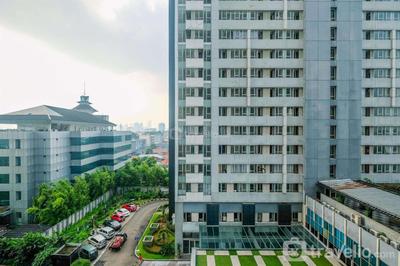 Comfort and Homey 2BR at Nifarro Park Apartment By Travelio