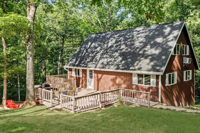 Loft style chalet w hot tub & fireplace main