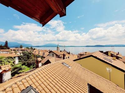 Casa Giuly , attico sul lago