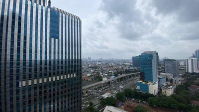 Comfort and Modern Look 2BR at 26th Floor Samara Suites Apartment By Travelio