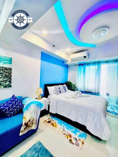 Ocean theme Navy Blue Deluxe Suite with PS4 and Balcony overlooking Manila Bay and Manila Zoo plus near Manila Yacht Club and Star City