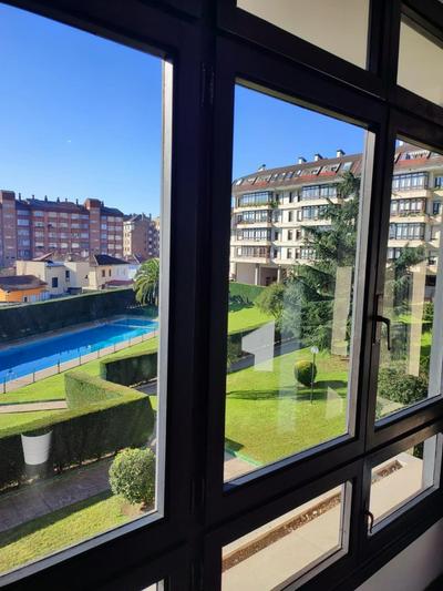 Apartamento con piscina y garaje