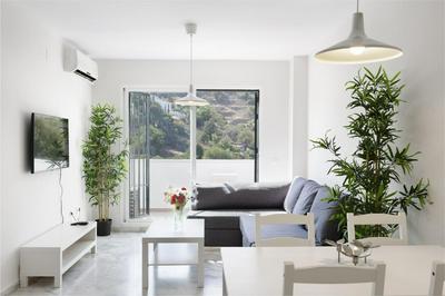 Charming 2-Bedroom Apartment with Terraces & Pool in Torrequebrada