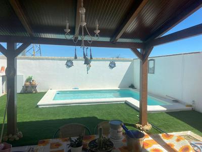 Buhardilla andaluza con piscina compartida