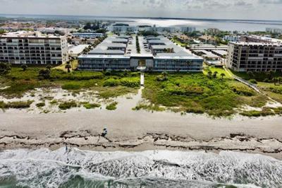 Just Cocoa Beachy - Cozy beachside condo with pool and beach access
