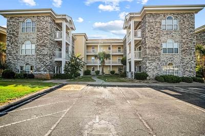 Stunning 2 Bedroom Condo with Vaulted Ceilings and Golf Course Views! Magnolia Place 303