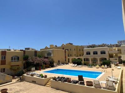 Quiet, Bright Apartment with Seasonal Pool and Close to the Sea