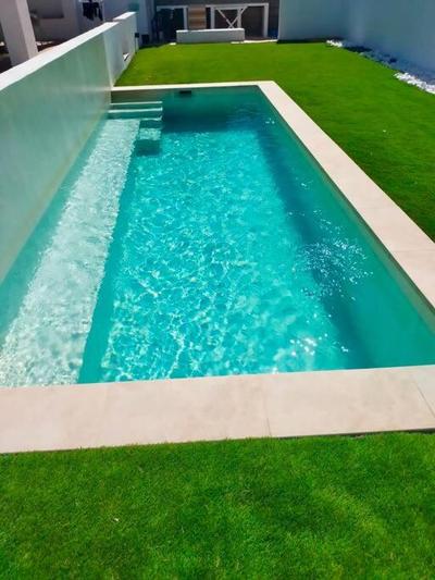 Estudio en planta baja, con piscina comunitaria