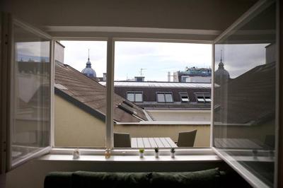 Central Rooftop Apartment with Balcony & AC