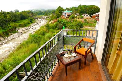 Staycation Premium Riviera Resort Dharamshala - A riverside resort with balcony view