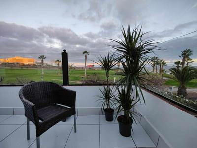Golf course and sea views with two terraces!