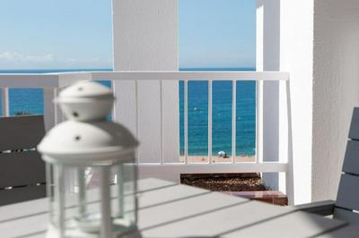 SeaHomes Vacations - Seafront Apt Fenals with PKG