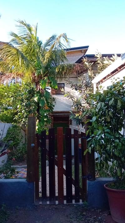 Quarto com banho privado e lavanderia