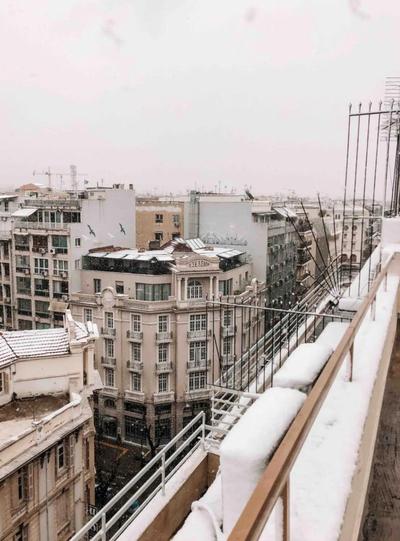 Rooftop Tiny Suite-Roof Deck-Sunbeds-City view