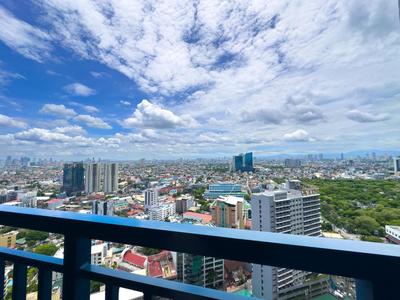 Air residences makati with balcony city lights view