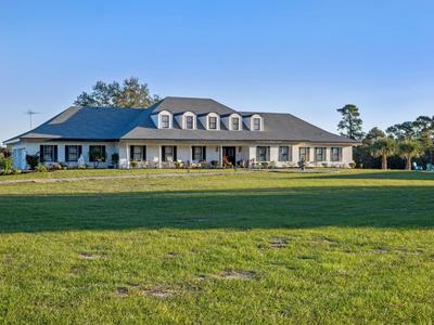 Centrally located spacious estate on 20 acres with a salt pool