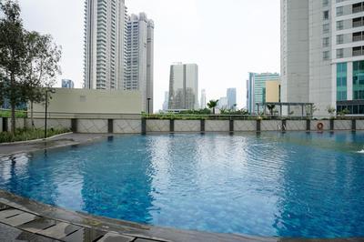 Cozy and Modern Look 2BR The Wave Kuningan Apartment By Travelio