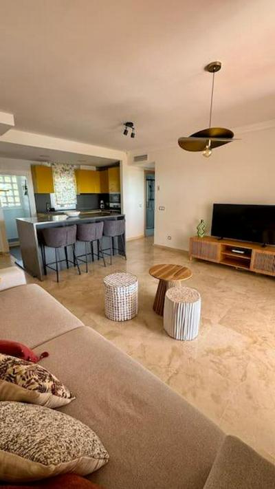 Logement vue mer, golf et jardin