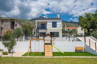 Villa Nacle with Heated Pool and Large Playground near Omis and Split