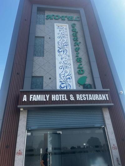 Green field hotel