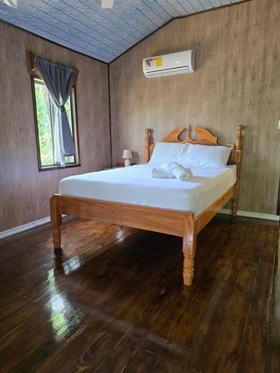 Hibiscus Cabin with AC at Freshwater Creek Cabanas