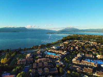 Orchidea Apt - 3 Piscine e un Bar a 200m dal Lago