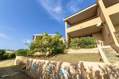 Village in Porto Corallo just 200 meters from the beach, apartments with private outdoor area