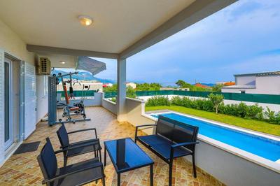 Family-Friendly Holiday Home with Private Pool, Playground, and BBQ