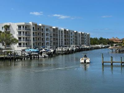 Luxury 2 Bed 2 Bath Waterfront Condo with Patio Sunsets Gym and Parking