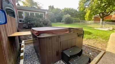 Near downtown with hot tub sleeps seven