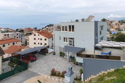 Apartman Oliva and Studio Delux for a family with swiming pool, free parking, terace with view at the sea