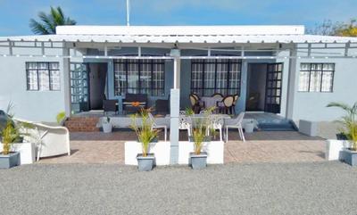 Villa Bella is 5 mins from the beach with amazing garden overlooking the pool