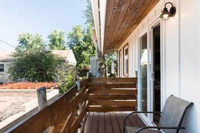 Sit Fireside in a Hip Guesthouse with a Balcony
