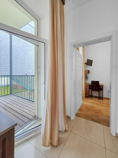 Spacious 3-Bedroom Retreat with Balcony for 8 Near Millennium Tower