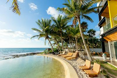 Angelina 28 Beachfront and Family Apartments - Modern and Relaxing Long Stays (20 min from Cancun Airport)