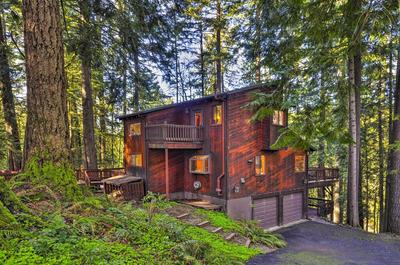 Cozy Sandy Retreat w/ Hot Tub & Forest Views!